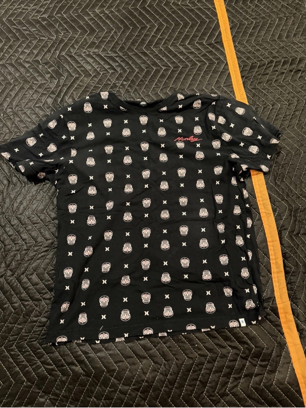 Hurley Black Men’s Tee with White Icon Repeat and Small Red Logo